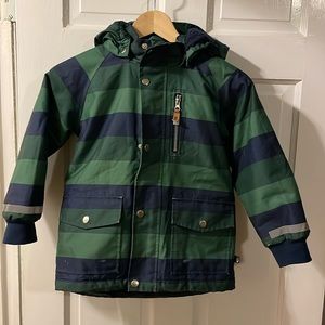 Selling our son used Danefeæ green winter coat, size 6, with reflective details.